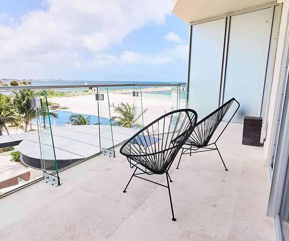 Sip morning coffee on the breezy oceanview balcony.