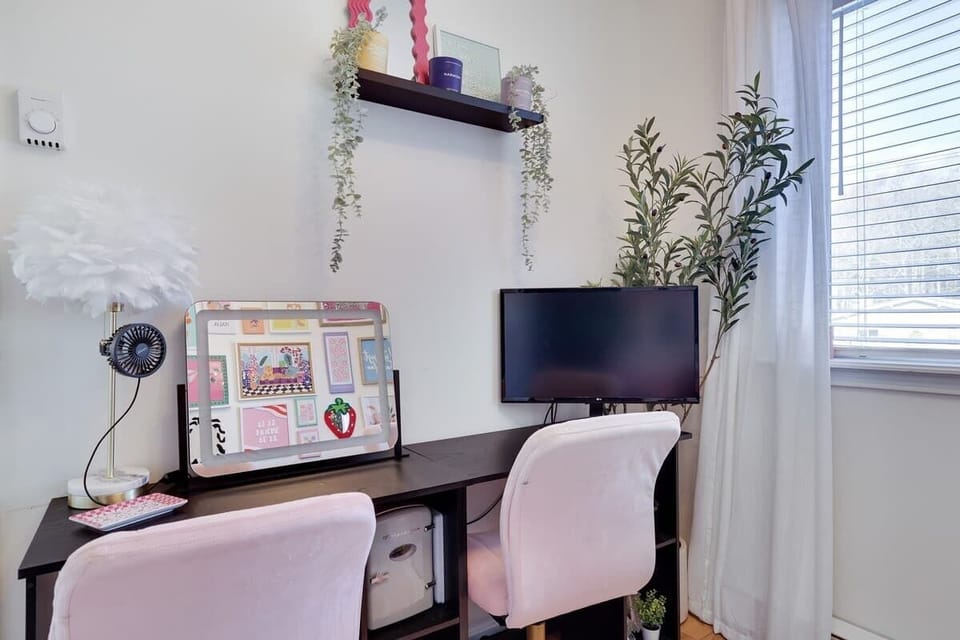 Home Office: Bright workspace with modern decor, perfect for productivity or remote relaxation!