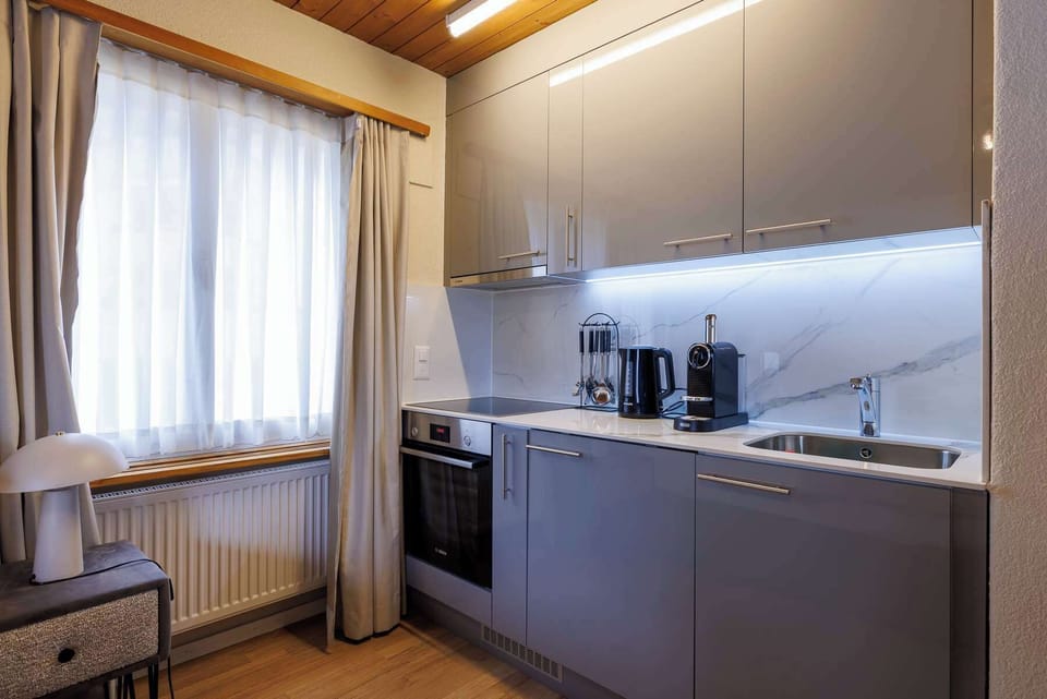 Classy kitchen equipped with all necessities. 