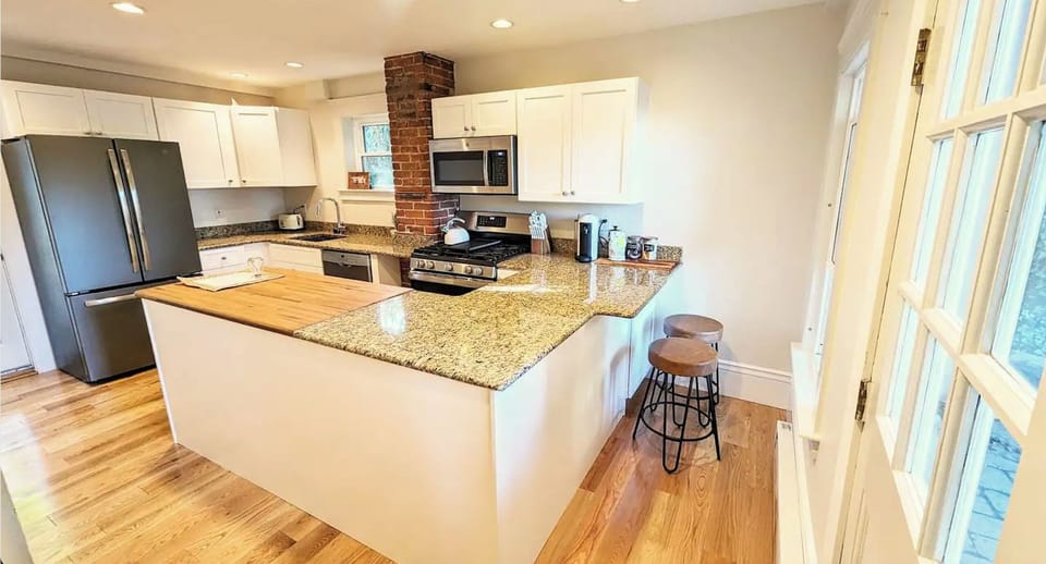 The downstairs kitchen is fully equipped with all the essentials for meals. 