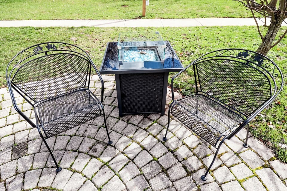Propane fire pit-  grab the chairs off shed deck or the beach rug from outdoor storage bin and hang by the fire