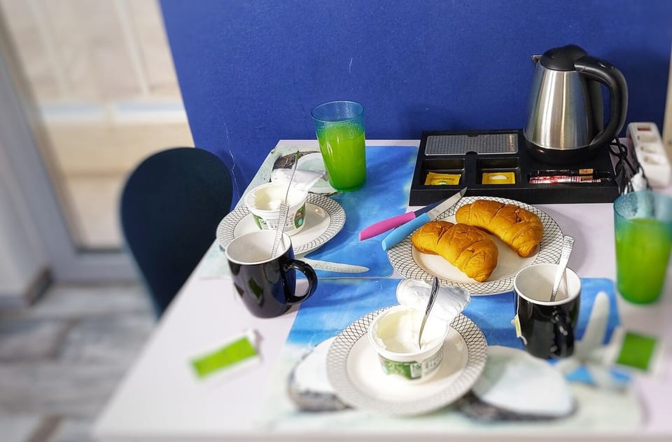 Our Complimentary Breakfast! We offer Croissant, Greek Yogurt, Orange juice &Tea