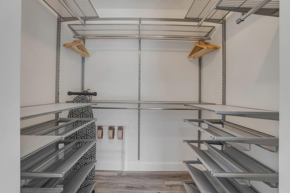 A full walk-in closet offers plenty of space for your travel wardrobe