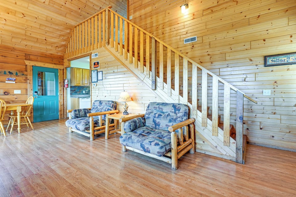 Living Room | Full Futon | 2 Twin Sleeper Chairs | Free WiFi | Main Floor