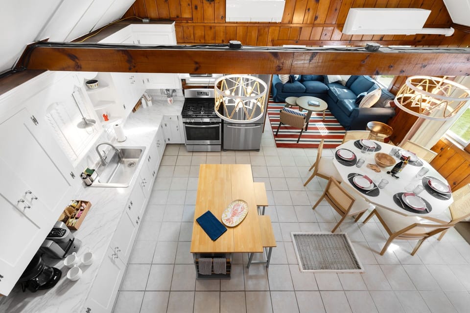 The kitchen seamlessly flows into the dining space,