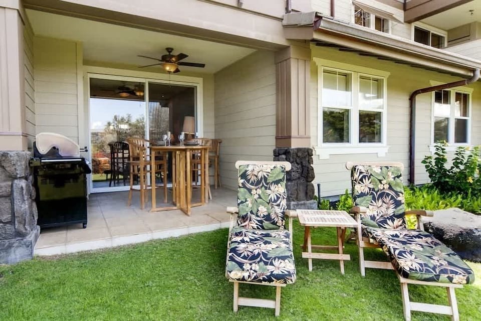 Unwind on padded floral loungers or enjoy meals on the covered lanai beside your private BBQ grill.


