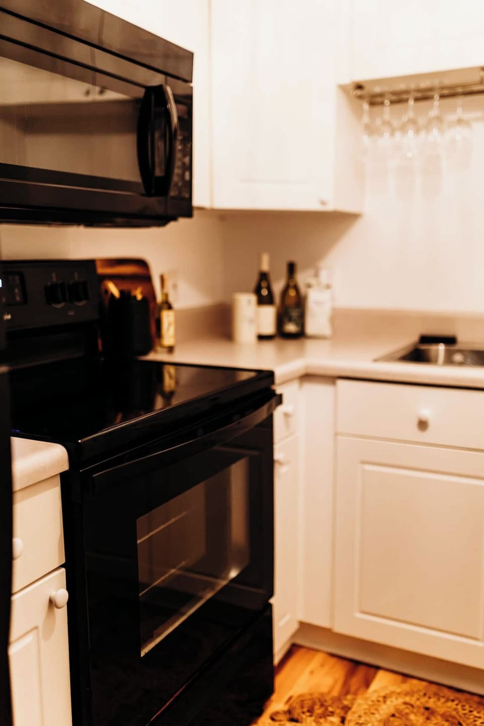 Full size black appliances ready for quick meals or chef's desires!