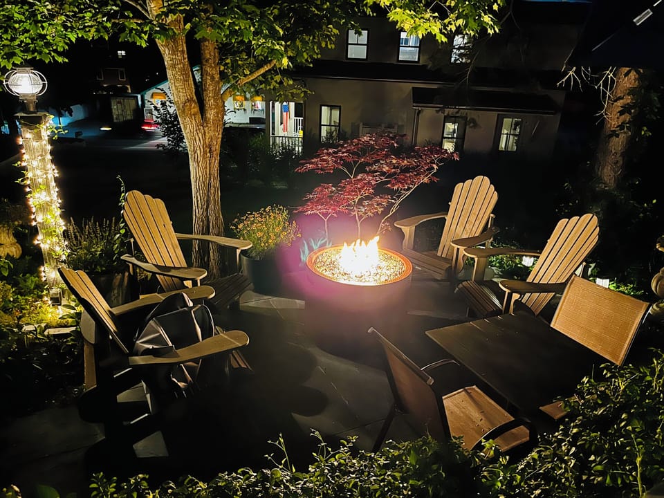 Terrace at night with fire pit