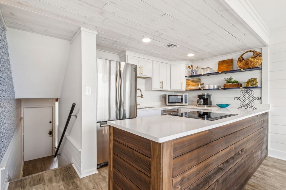 Kitchen and Stairs Back Down to Entrance