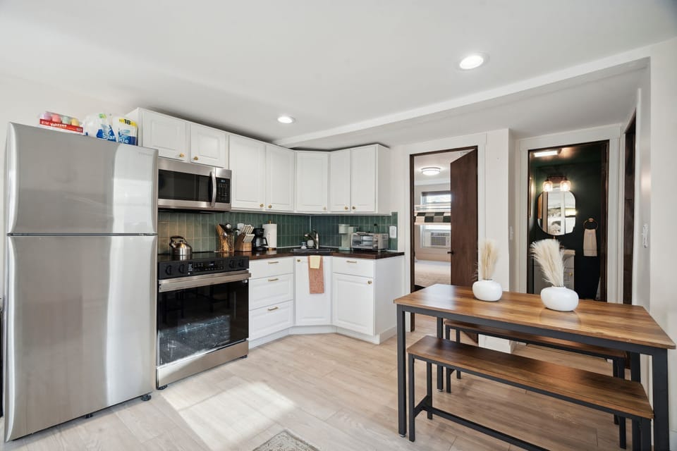 Kitchen and dining area side by side for seamless cooking and mealtime flow!