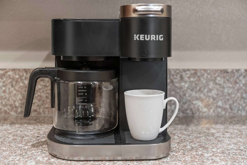 Start your mornings right with the coffee machine, ready to brew your favorite cup of coffee to kickstart the day.