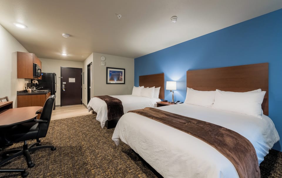 Relax together in a bright studio room with convenient kitchenette.