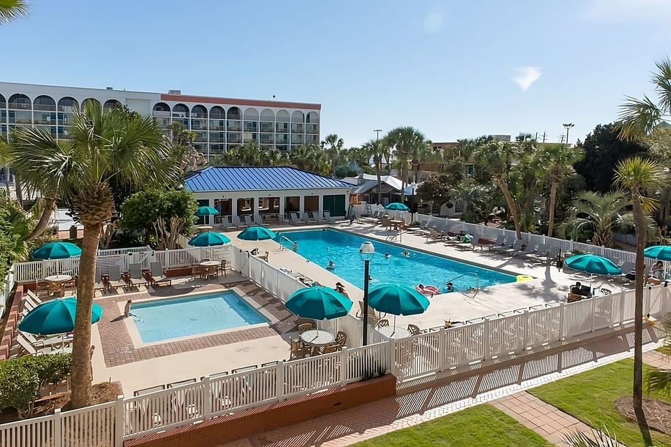 Spend sunny afternoons poolside with plenty of loungers.