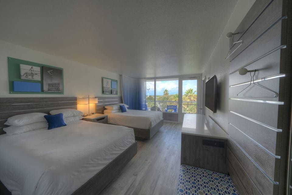 Unit with 2 Queen beds. Exact unit will be assigned upon arrival. Views, colors, and decor may vary.