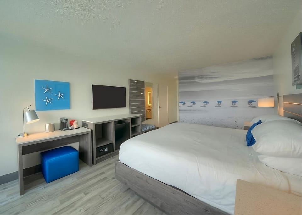 Kick back after beach days with TV and lounge seating.