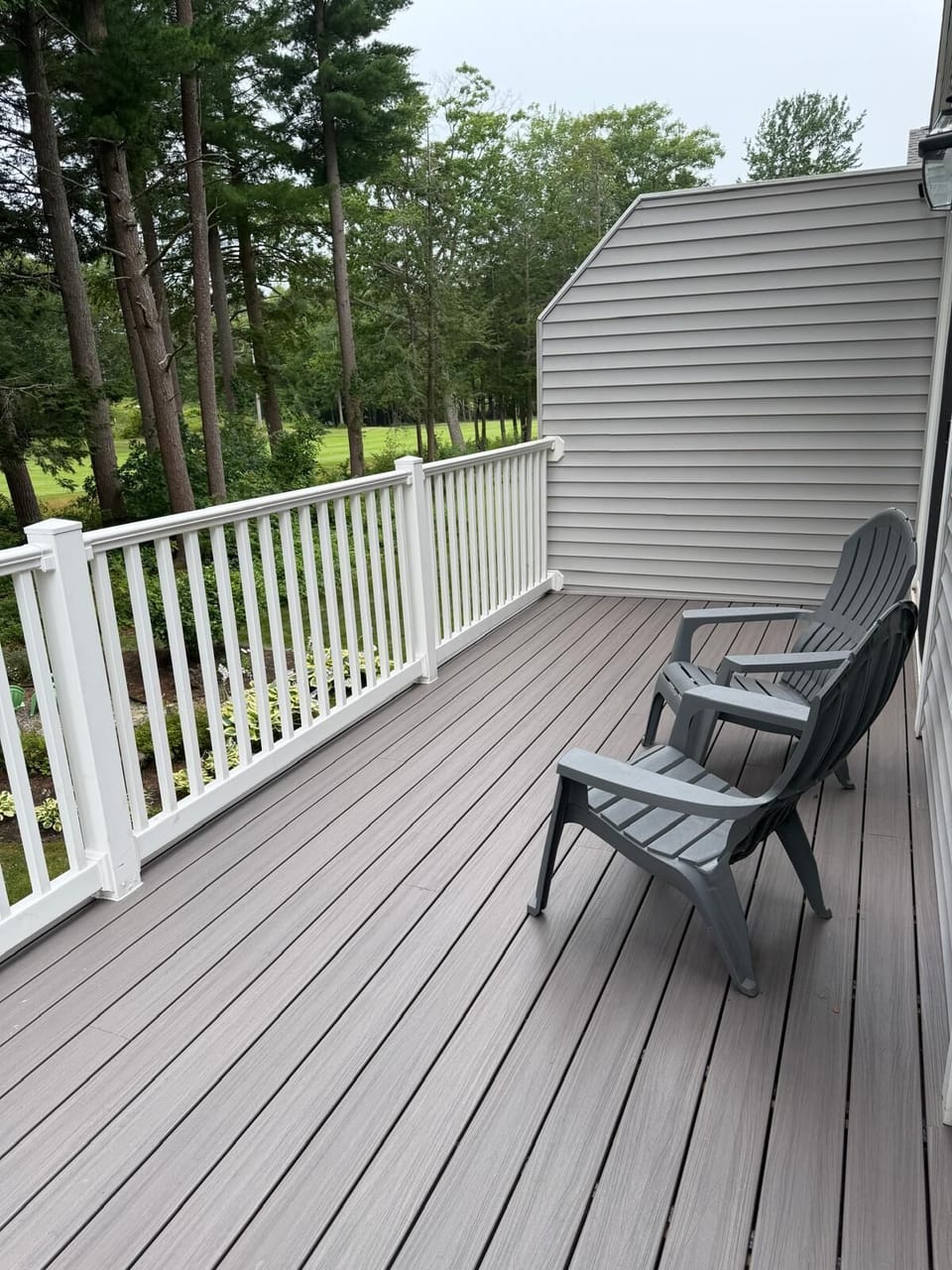 Relax on the private back deck with comfortable seating and peaceful, direct views of the lush Dune Grass fairways