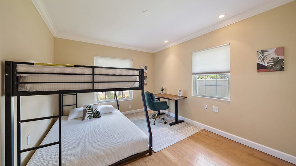 Bunk beds and office area for those traveling for remote work