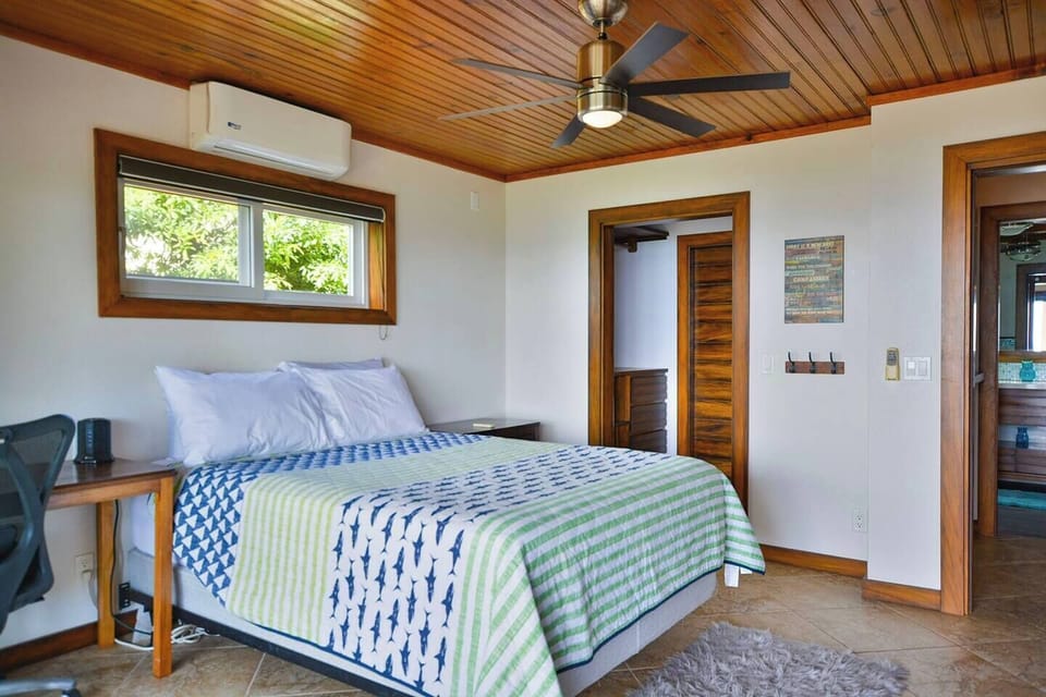 Main floor bedroom with queen bed