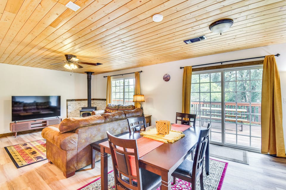 Living area with comfy seating and Smart TV