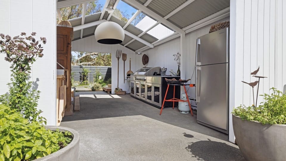 Large undercover BBQ area with Paella cooker, BBQ Rotisserie and Pizza Oven 