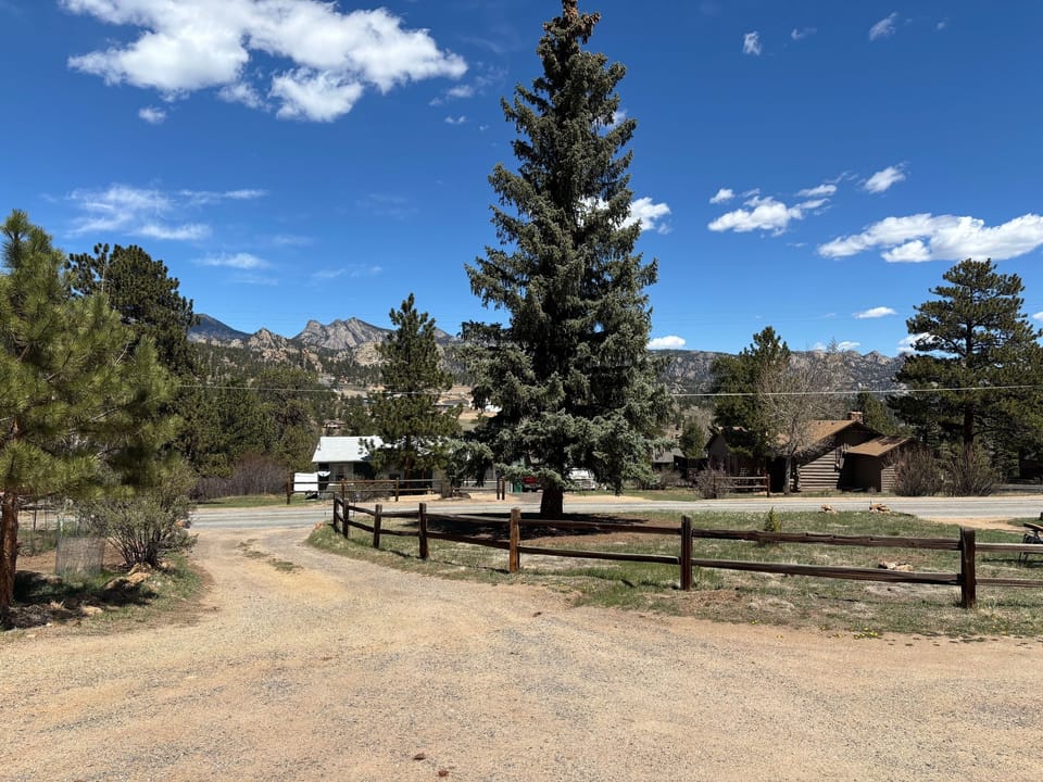 View from porch overlooking picnic benches
