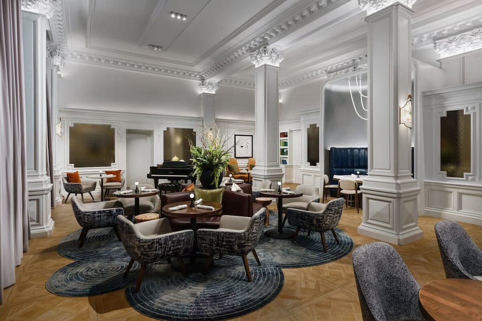 Sip and socialize in a refined lounge with live-music vibes.