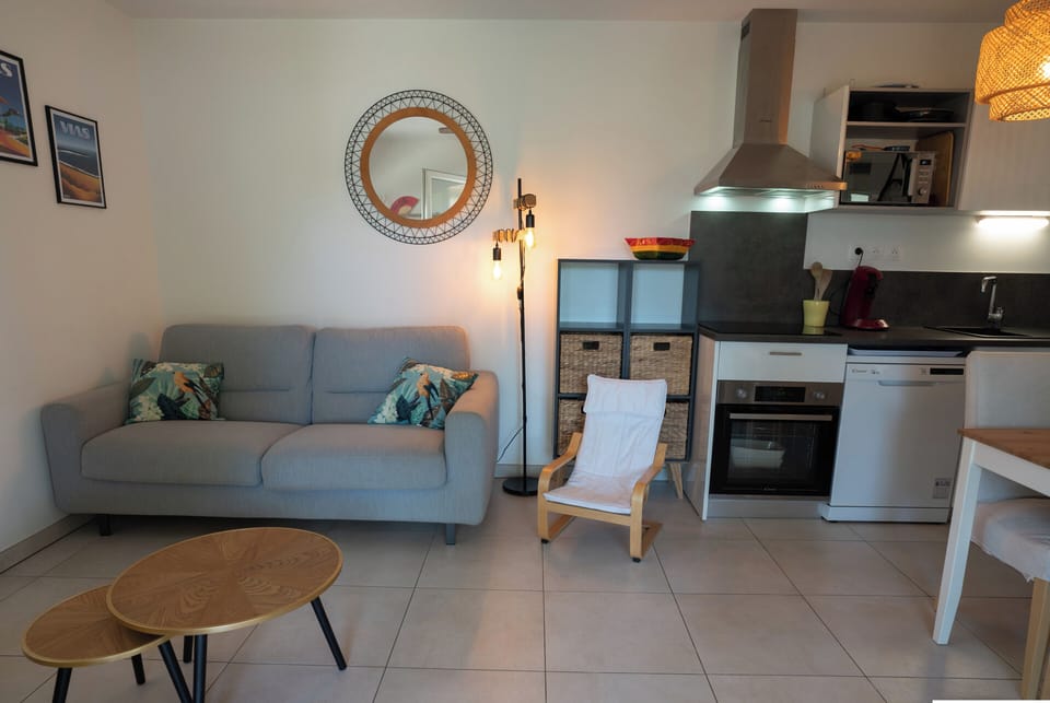 Large air-conditioned living room with fitted kitchen, lounge and living room