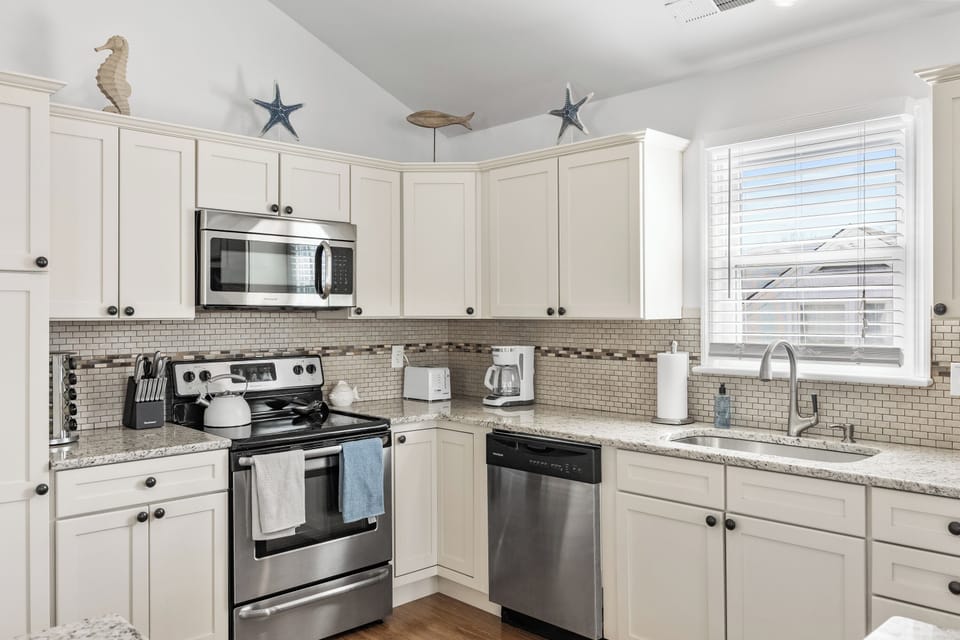 Sleek kitchen with modern amenities
