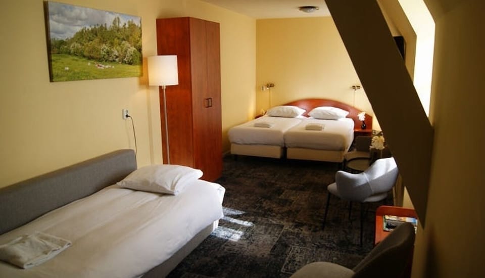Unit with 2 Single beds and a sofa bed. Exact unit will be assigned upon arrival. Views, colors, and decor may vary.
