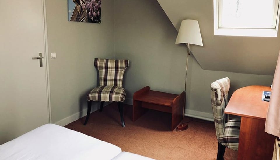 Unit with 2 Single beds. Exact unit will be assigned upon arrival. Views, colors, and decor may vary.
