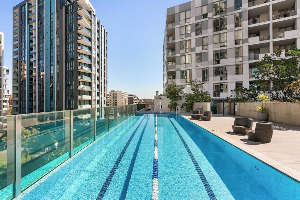 Cool off or keep active in the shared sparkling lap pool, with outdoor seating to soak up the sun.