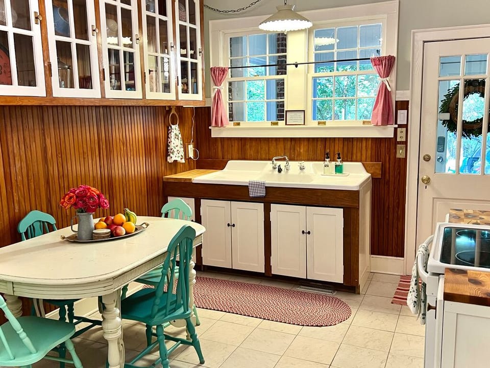 Large Kitchen with table for four, original farm sink, cooking / baking needs.