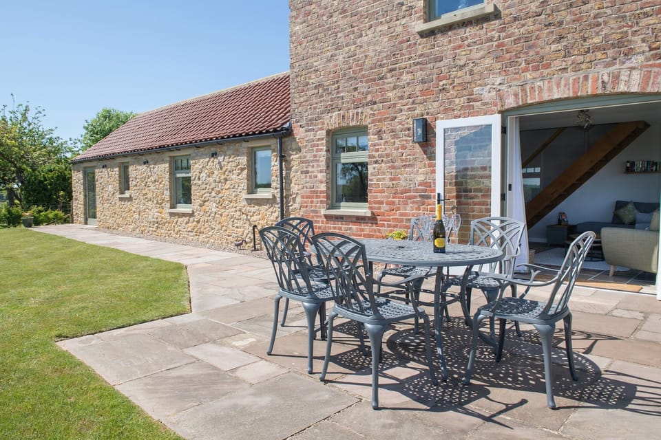 Private enclosed garden with lawn, patio and BBQ