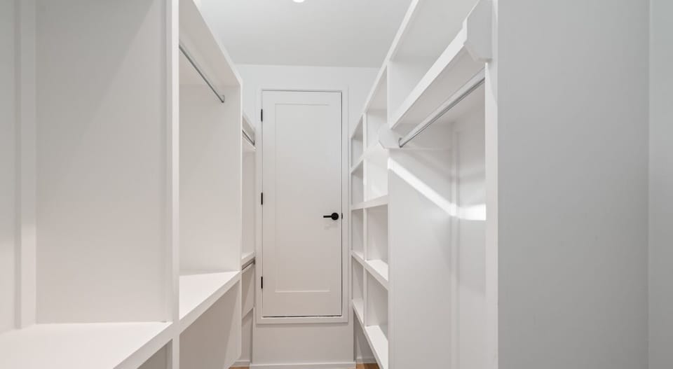 Step into your own Narnia—this walk-in closet transforms storage into a magical journey of style.