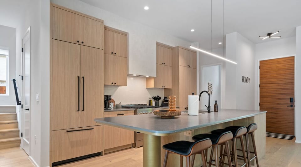 A kitchen-island paradise—prep, pour, and party in this stylish space designed to wow.