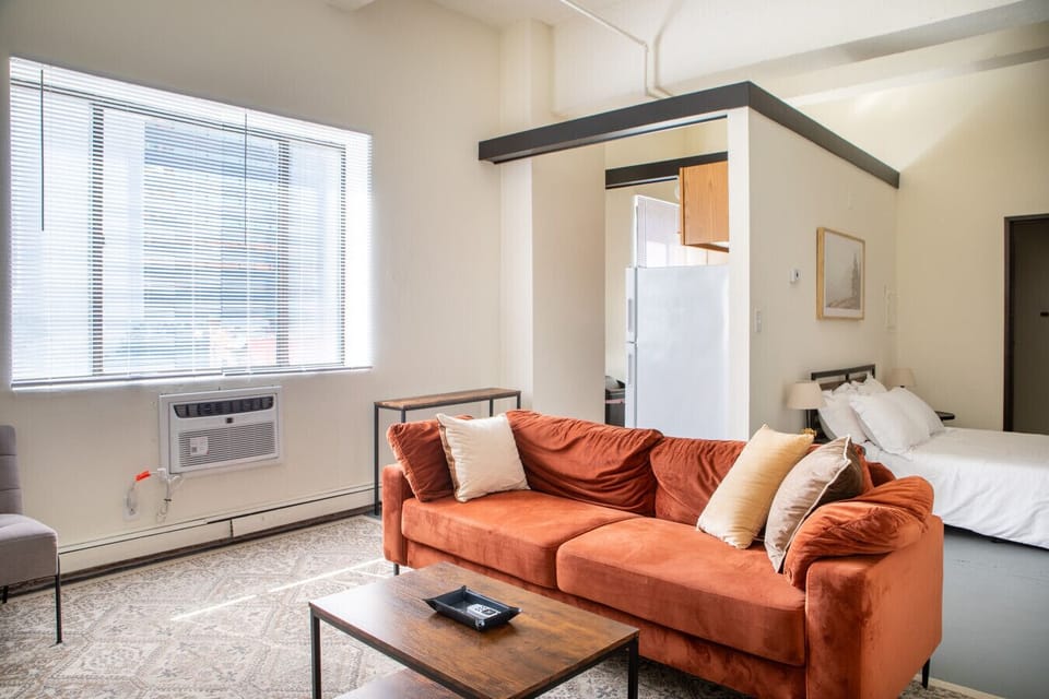 Bright, open-concept living area designed for both relaxation and productivity.