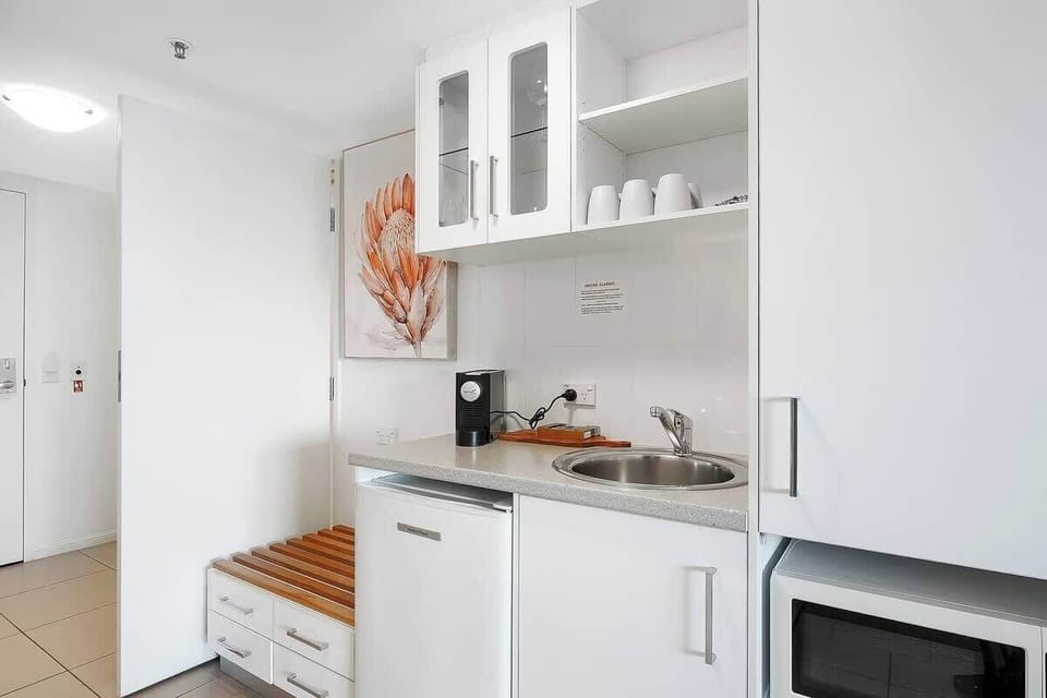 Whip up a quick bite to eat in the kitchenette, equipped with a mini-fridge, microwave and Nespresso machine.