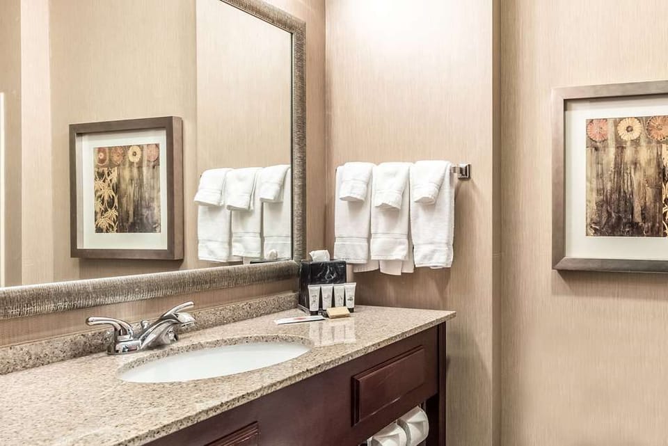 Refresh each morning at the bright vanity with fresh towels.