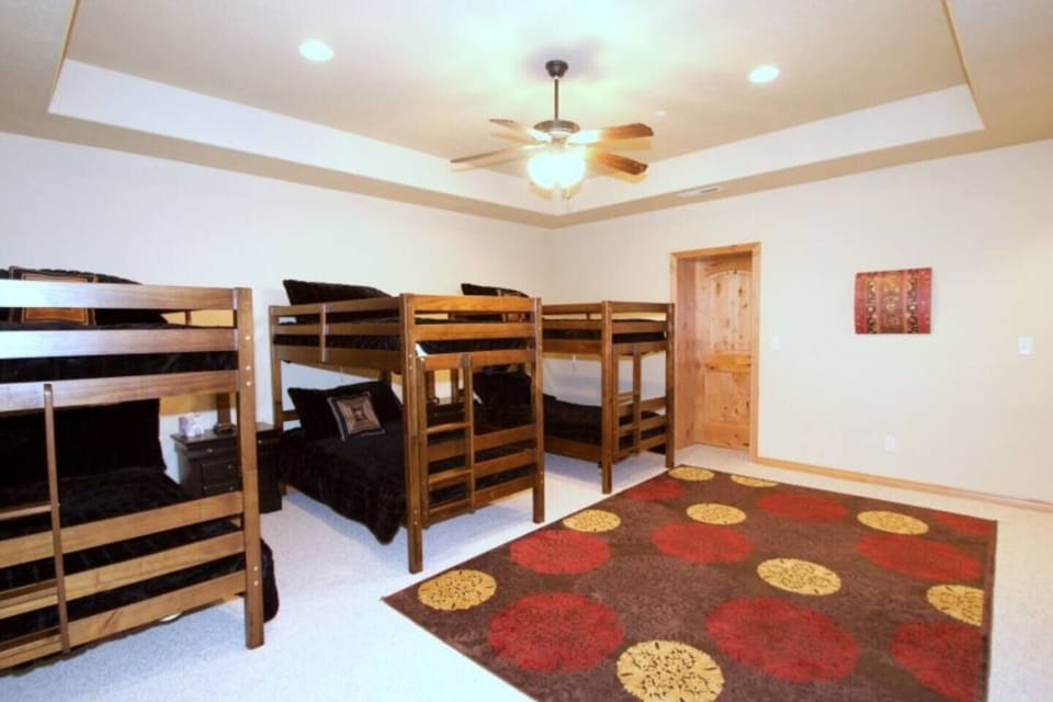 The ultimate hangout for kids and groups—this fun-filled bunk room features 6 twin beds and plenty of space to spread out and unwind.