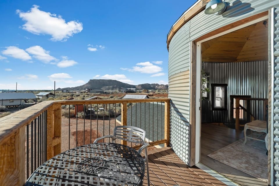 Step onto your private balcony for coffee at sunrise or sunsets that light up the red rock. View facing the Northwest. Please note we have neighbors on both sides, one of which is cows & horses. 