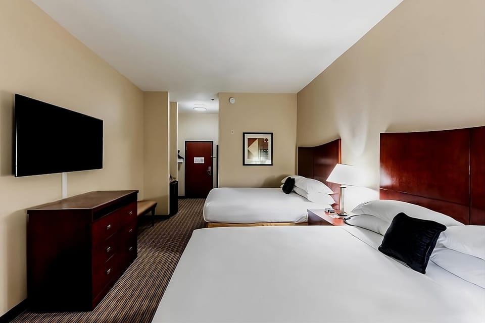 Stretch out on crisp linens and enjoy easy in-room entertainment.