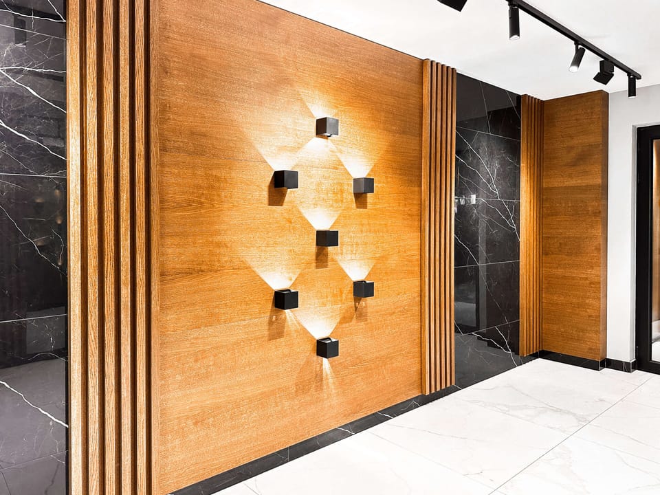 Arrive in style — you’ll walk through this elegant lobby every day. Curious about the building’s award-winning design? Ask us!