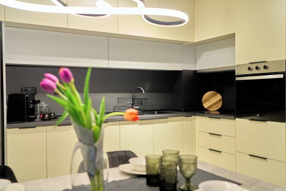 Whip up your favorite meals in this sleek, fully equipped kitchen. Curious about local markets? Just ask!