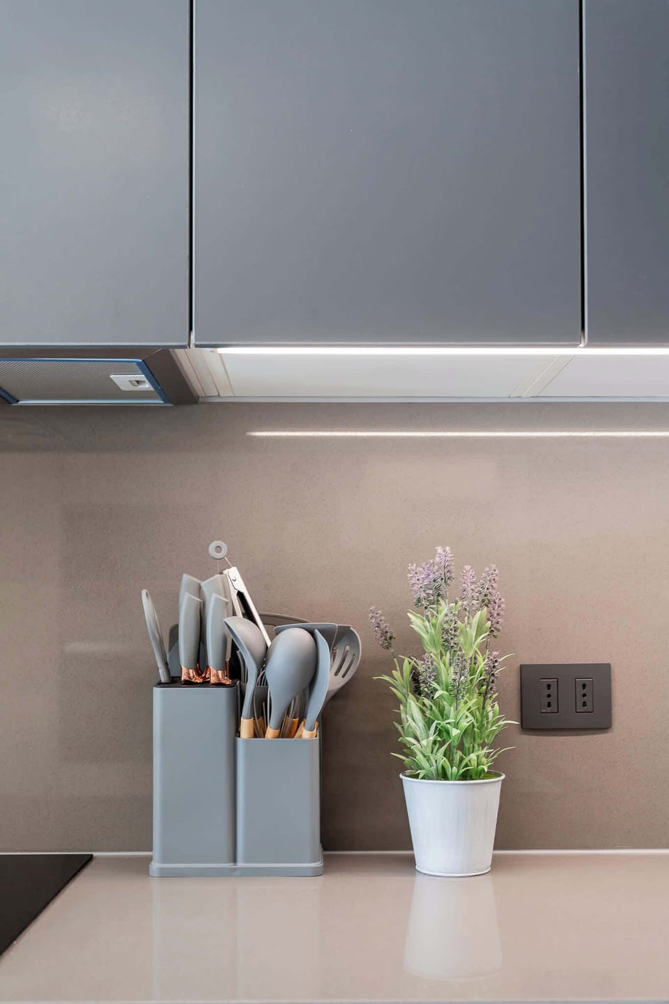Experience a modern kitchen with sleek cabinetry and stylish utensils, perfect for your culinary adventures during your stay!