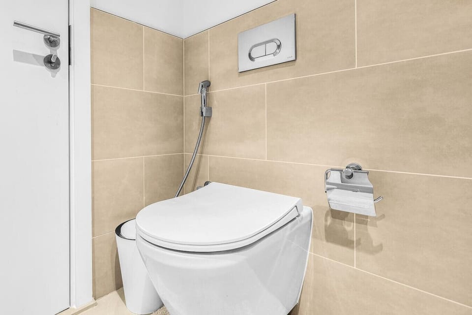 Modern Bathroom: Enjoy sleek designs and premium fixtures in this stylish retreat!