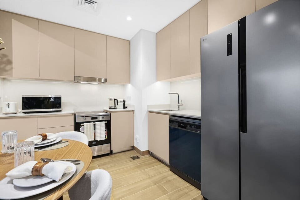 Kitchen: Sleek modern design, fully equipped for delightful meals with a stylish dining area!