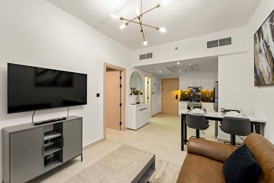 Living Room: Modern elegance with sleek furnishings and vibrant accents for ultimate relaxation!