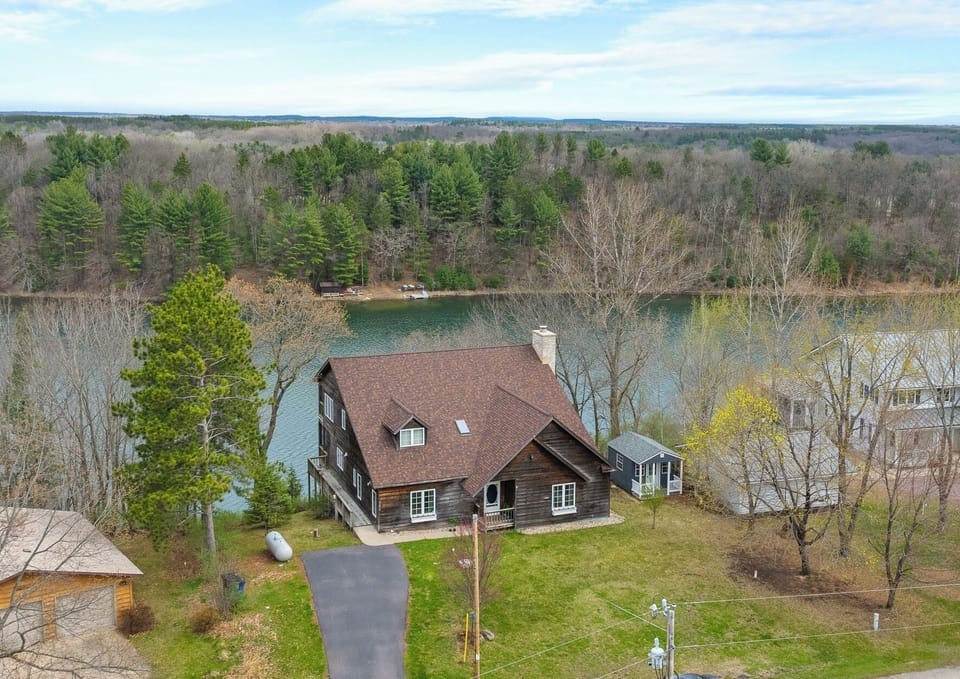 Enjoy elevated views and tranquility in this cabin above Deep Lake.
