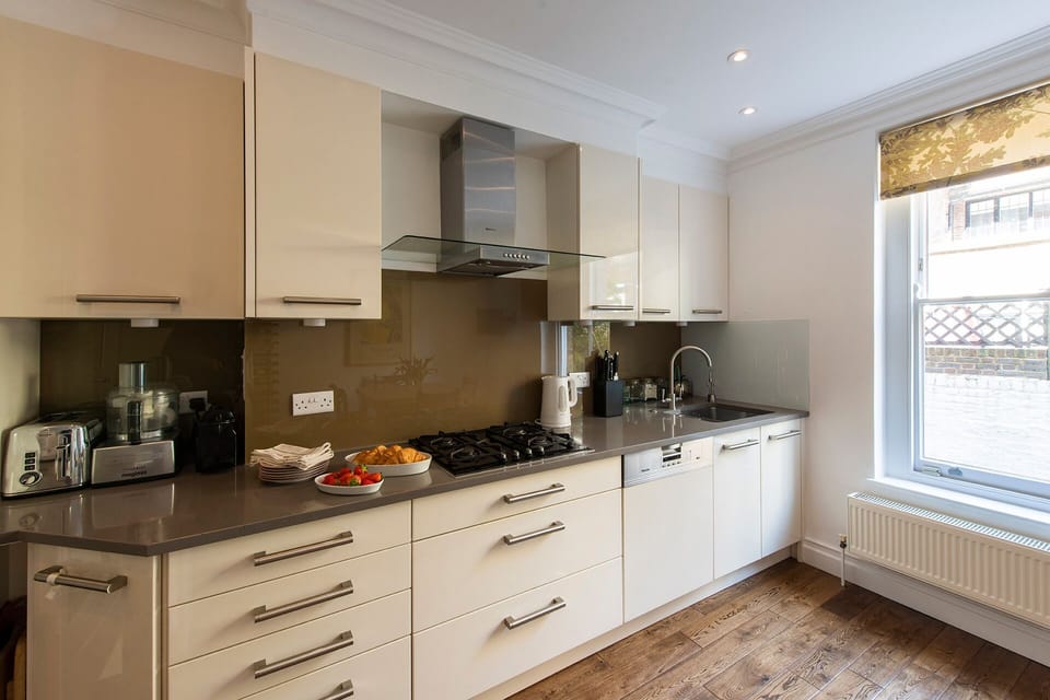 Modern kitchen is fully equipped.