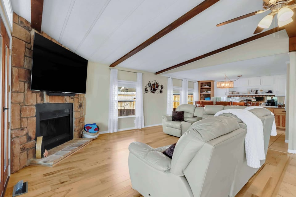 Curl up in Unit A’s breezy living room & stream your favorites on the smart TV